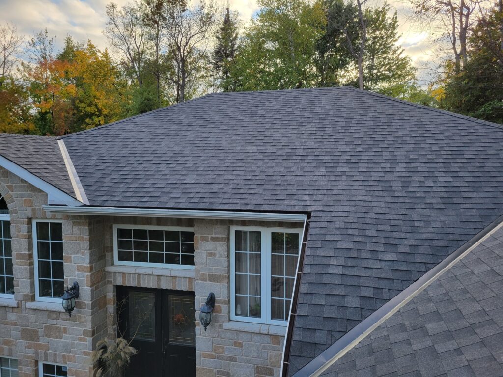Expert roofing contractor completing roof installation
